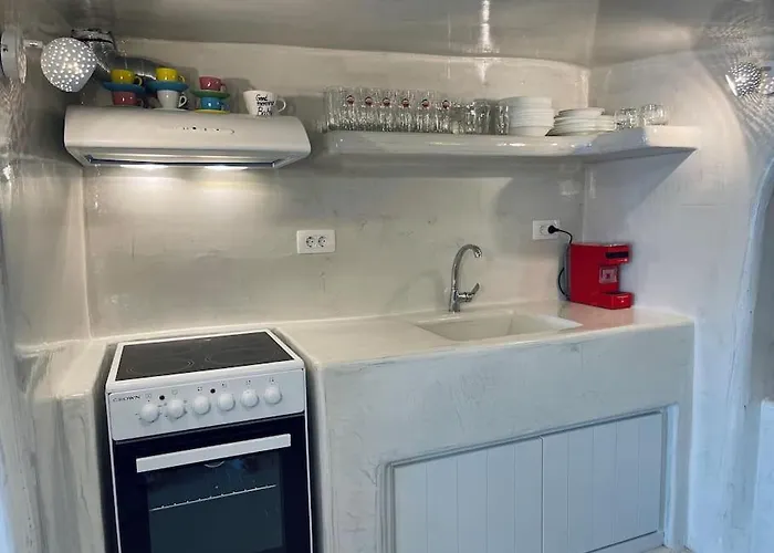 Cave Of Seafront Sunset View Santorini