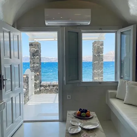 Cave Of Seafront Sunset View Santorini