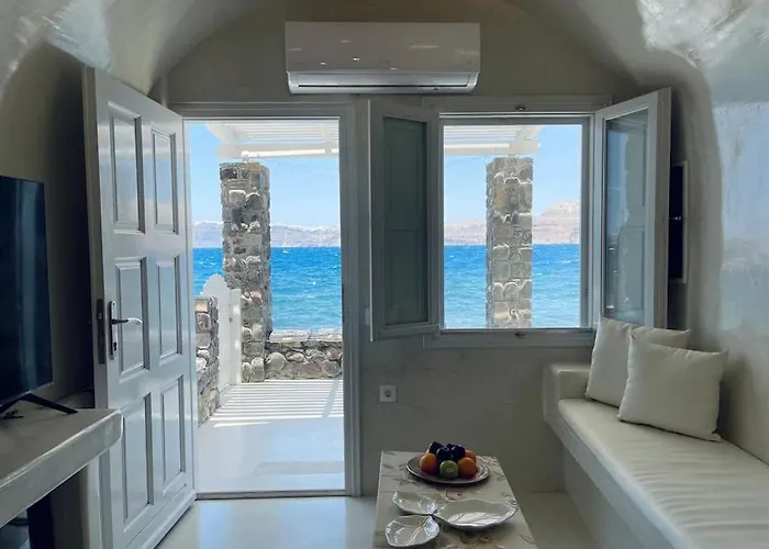 Cave Of Seafront Sunset View Santorini