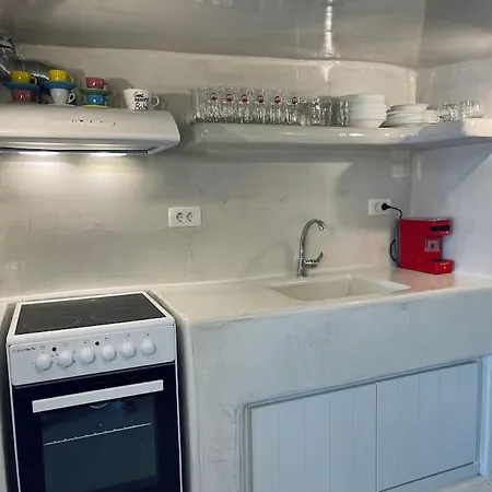 Cave Of Seafront Sunset View Santorini